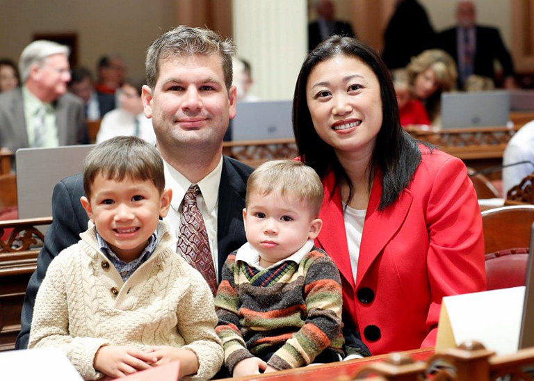 Sen. Nguyen, and husband Tom Bonikowski, and their sons